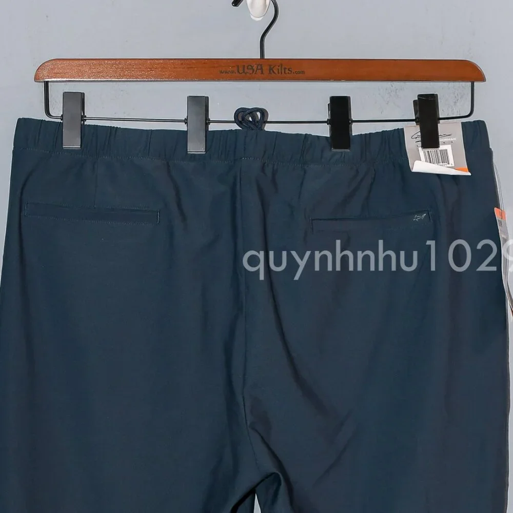 NWT Greg Norman Men’s Pull-On Short in TAN